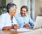 elderly couple on laptop