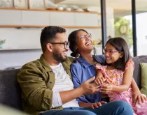 happy family on couch