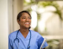 smiling nurse outside