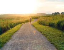 Rural health man running on gravel road