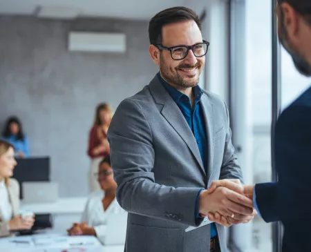 two men shaking hands