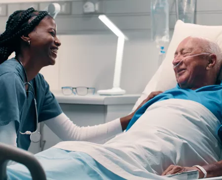 nurse and patient talking happily