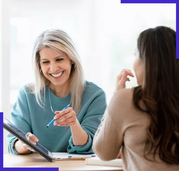 women looking at tablet